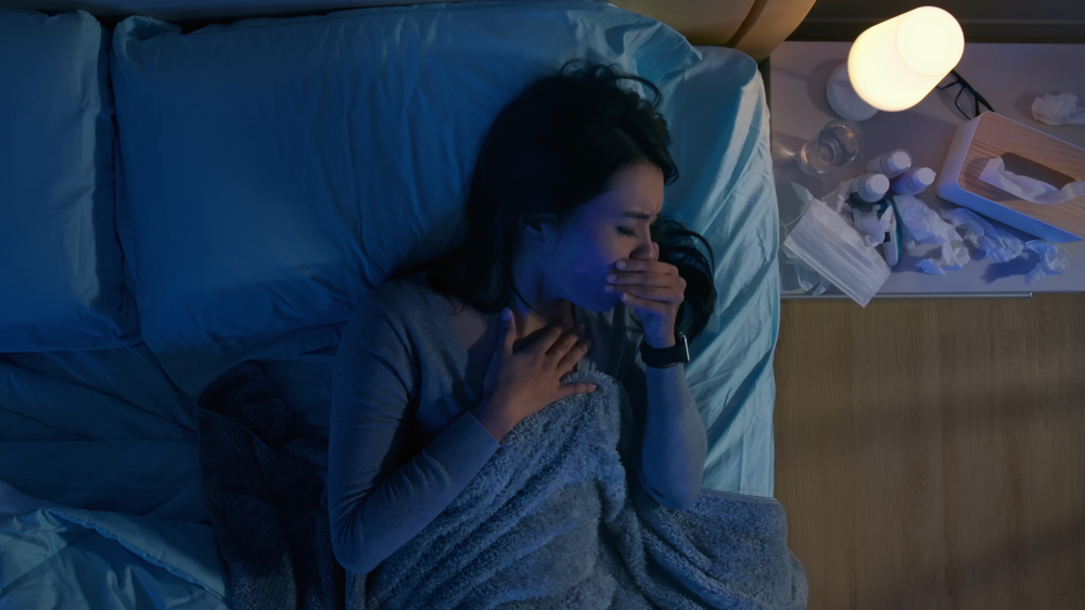 Woman suffering with cold