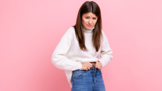 Why Your Clothes Suddenly Don't Fit: The Baby Bump Appears