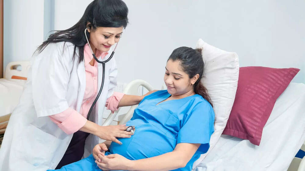 Doctor checking pregnant woman