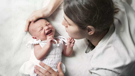 Why Mothers Often Wake Up Before the Baby Cries