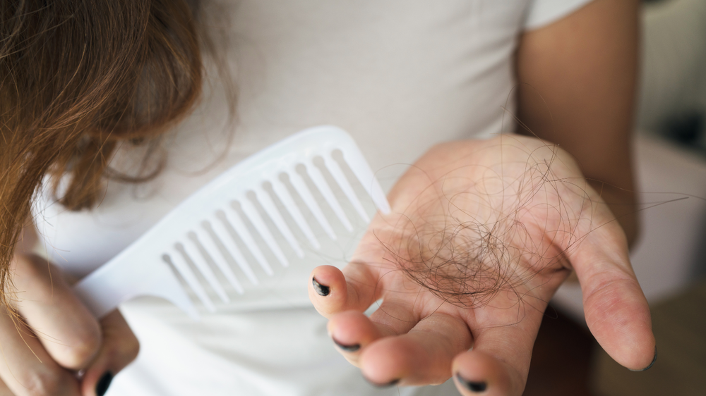 Everything You Need To Know About Hair Shedding and Growth After Baby