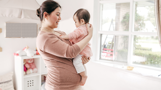 Why Does Your Belly Still Look Pregnant Months After Delivery? Experts Explain