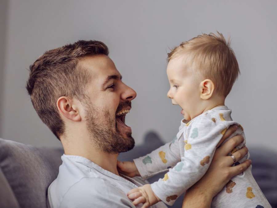 father singing to child-Nursery Rhymes In Language Development