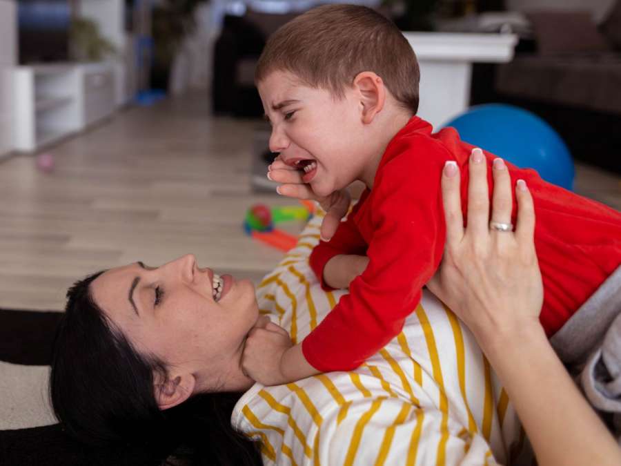 mother calming the crying child- Toddler's Emotional Intelligence