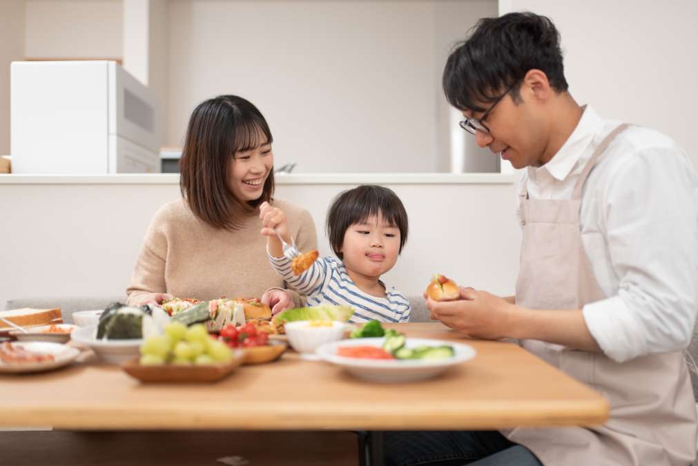 Family eating lunch at home-Curiosity In Early Childhood