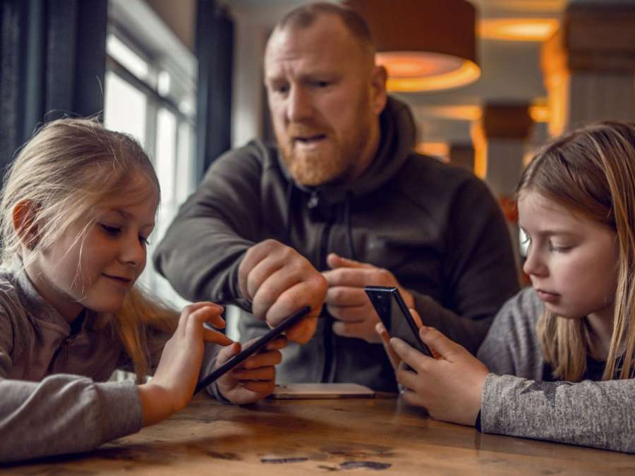 father refusing his children phones-Effect Of Screen Time On Early Childhood