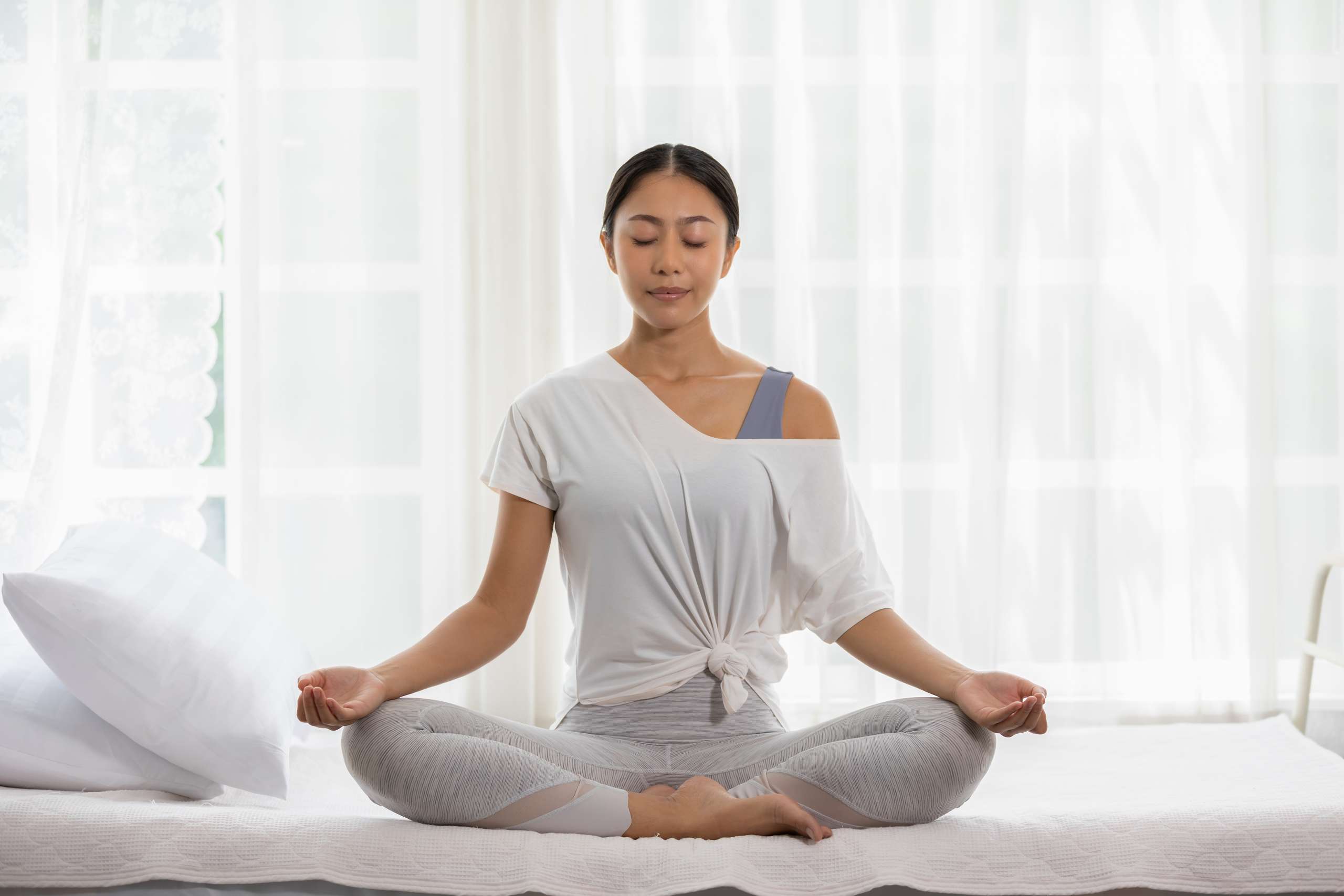 A woman practicing Yoga- PCOD, PCOS, And Acne
