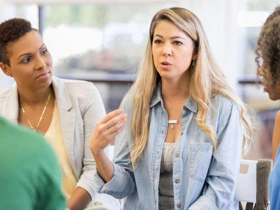 WOMAN TALKING TO EACH OTHER IN SUPPORT GROUPS- Preconception counselling