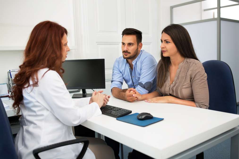 Couple at doctor's to discuss about child