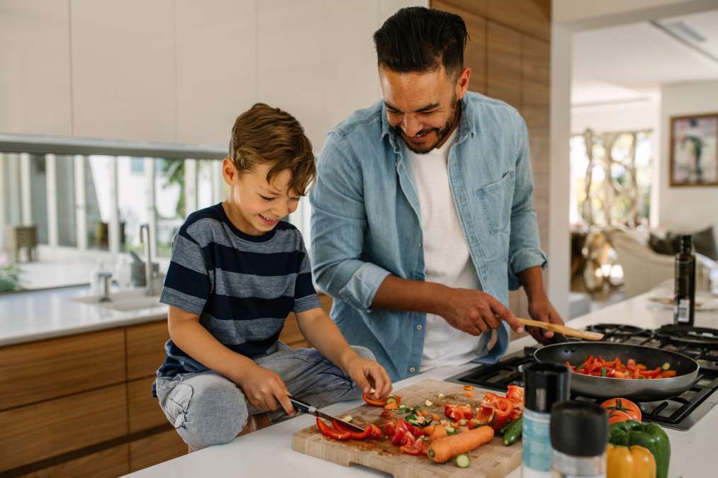 CHILD COOKING WITH FATHER- responsibility in children