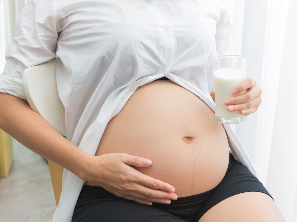pregnant woman with milk