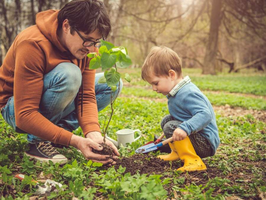 father and son exploring nature- Gardening Activities for Children