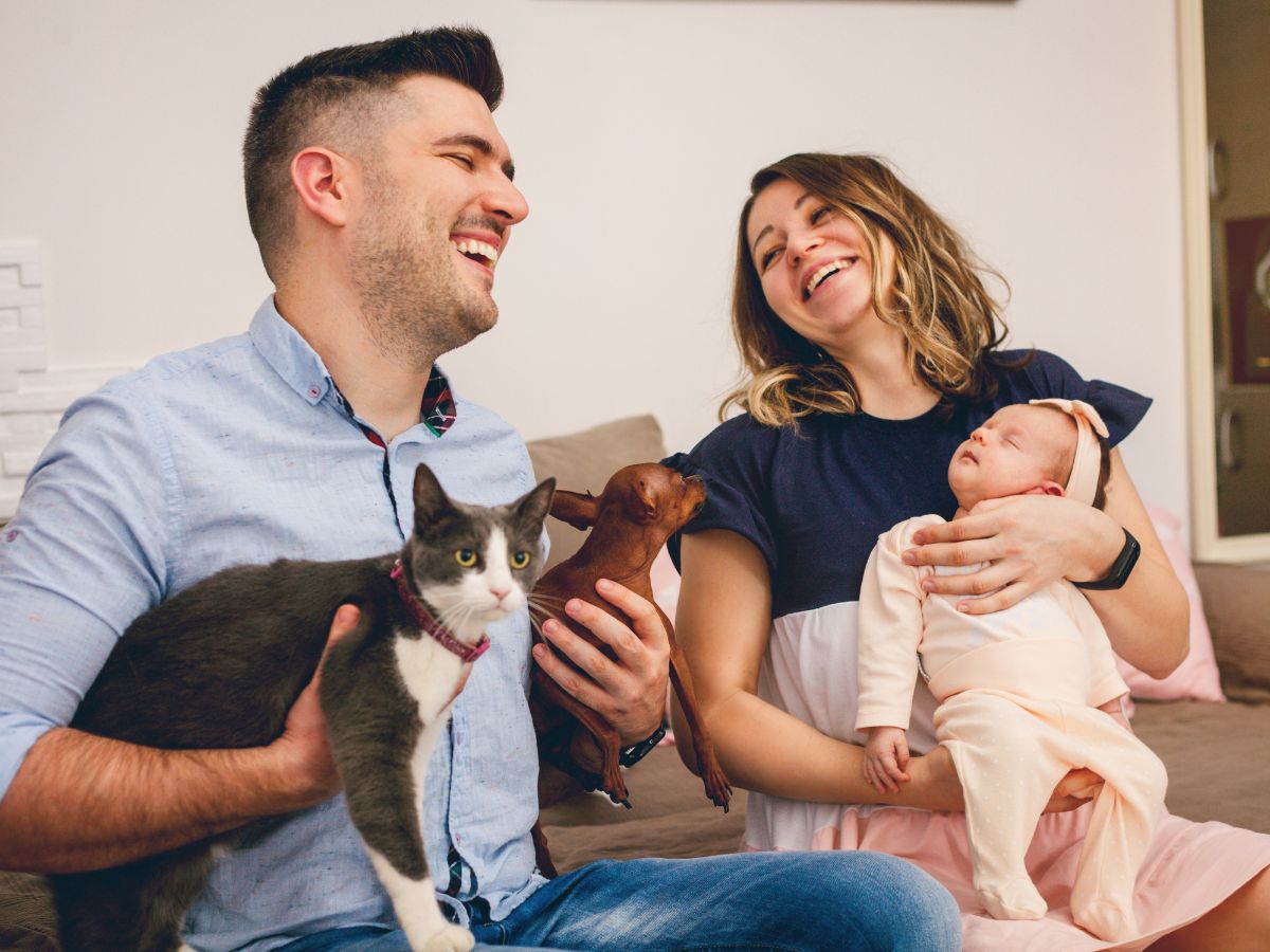 happy family with pets-Introducing Pets To Your Newborn