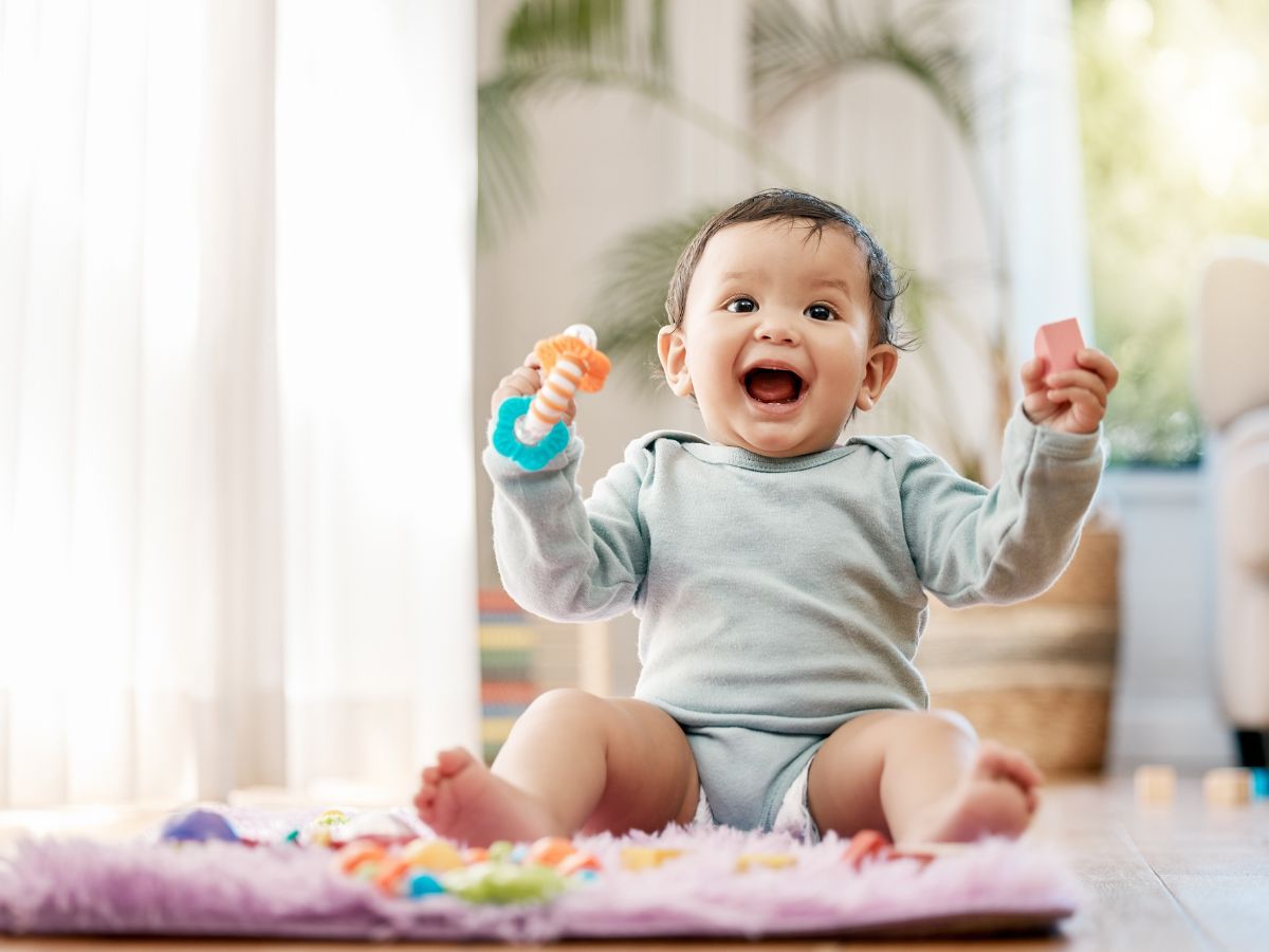 child playing with toys-Baby Holding Objects