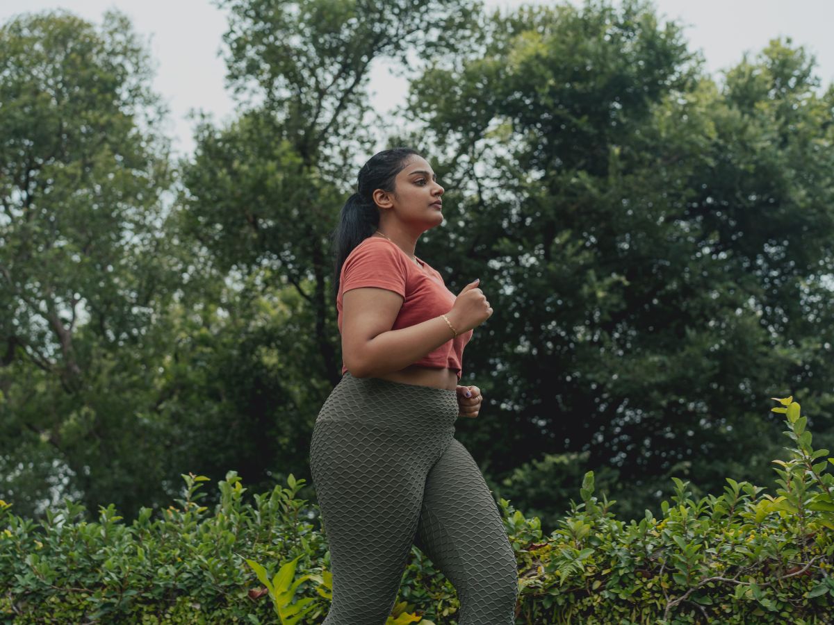 overweight woman jogging-Obesity Can Affect Conception