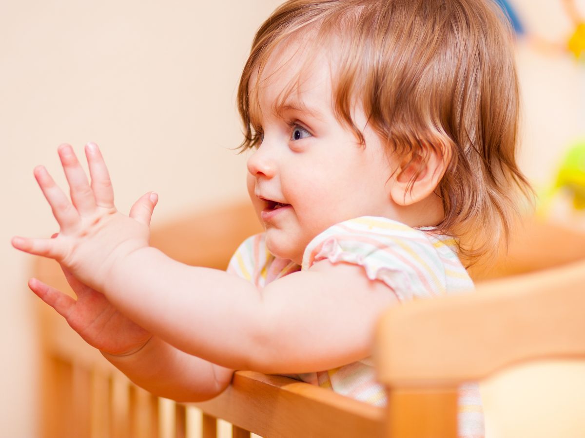 child clapping