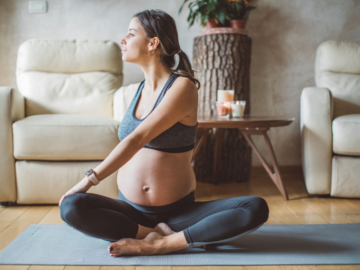 pregnant woman exercising- Pregnancy Symptoms And Discomforts