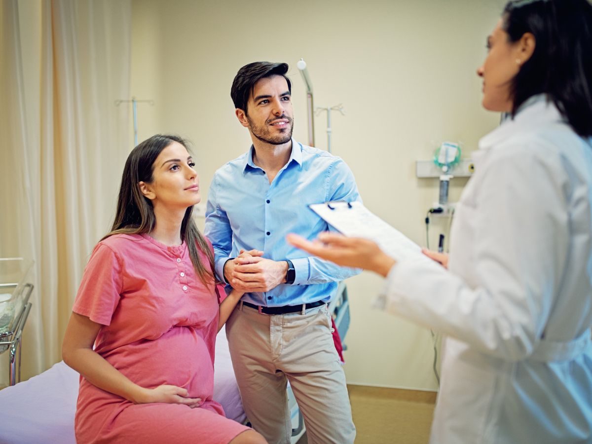 full term pregnant woman visiting doctor- Conception After a C-Section