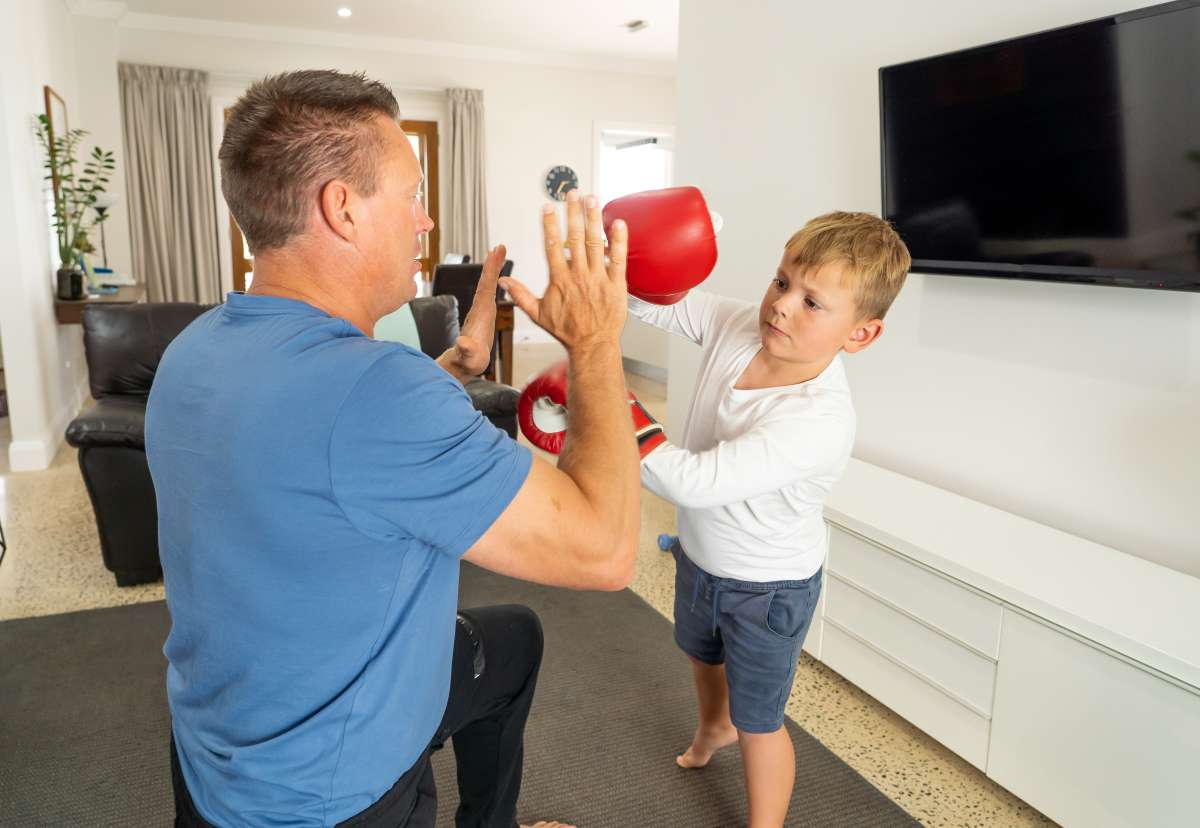 Father and son boxing- Challenges As A Single Parent