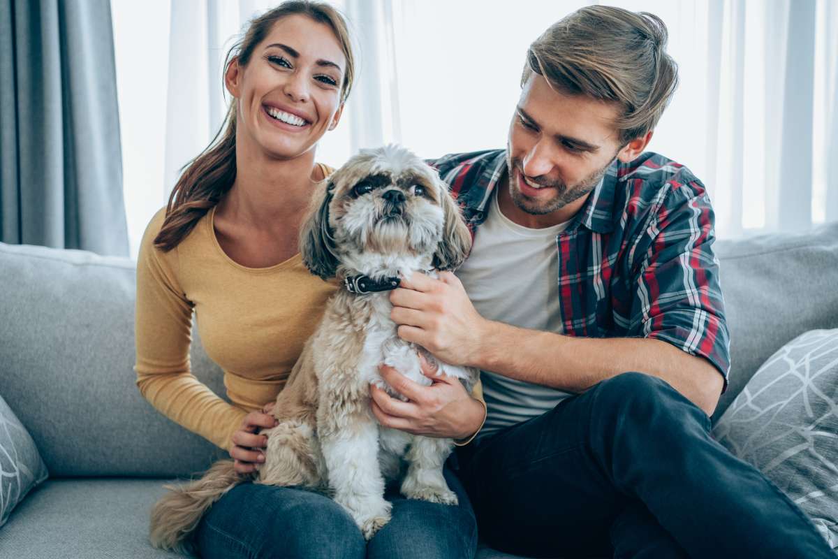 couple with pet-Role Of Pets In Family Planning