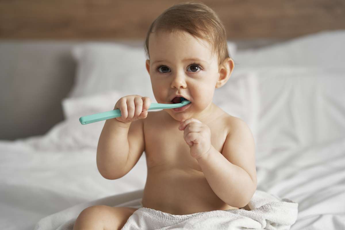 child brushing his teeth- Baby's Fine Motor Skills