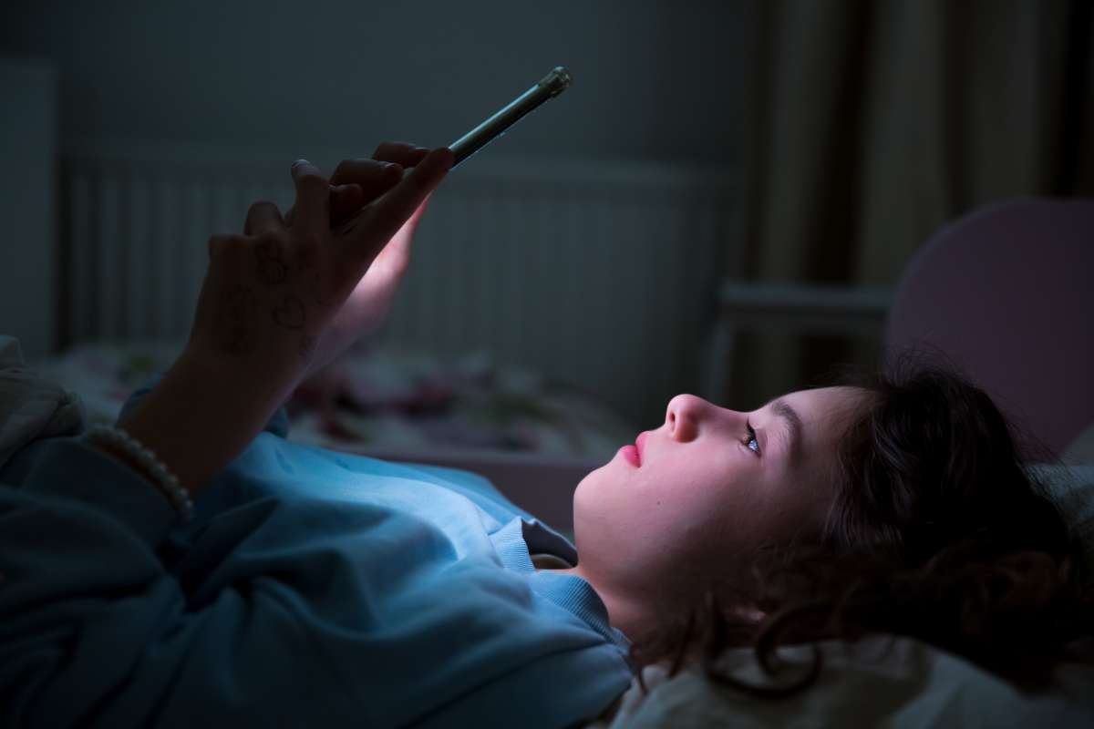 child using phone- Healthy Habits For Screen Time