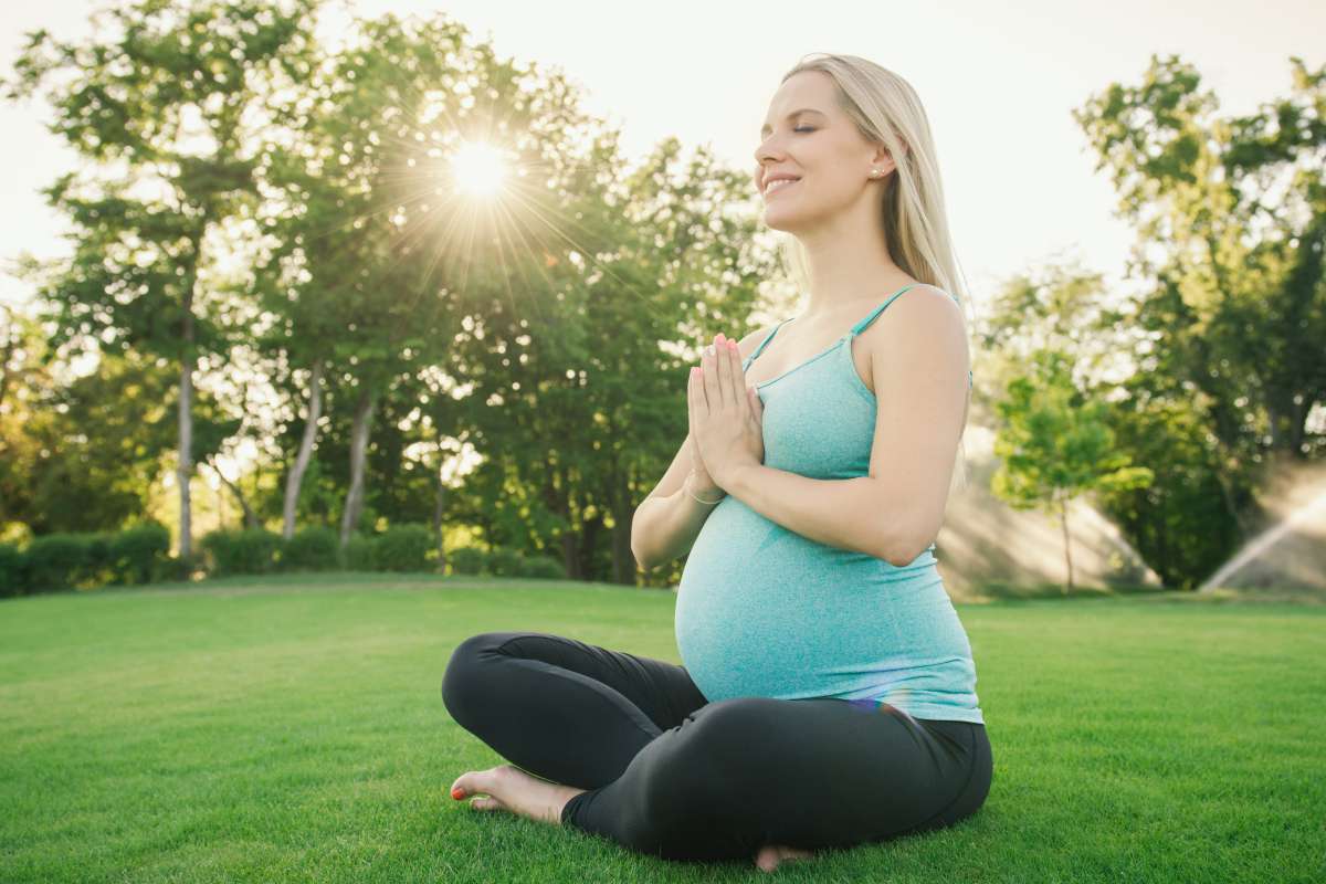 woman doing yoga-Exercise Recommendations For Second Trimester