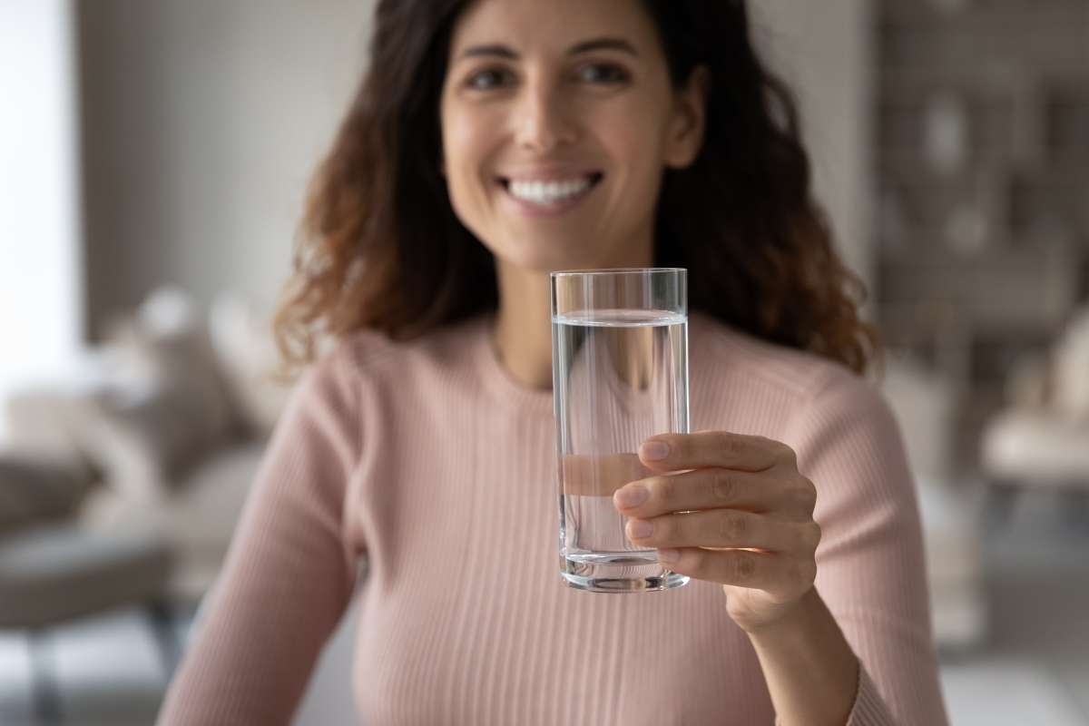 pregnant woman drinking water- The Importance Of Hydration In Pregnancy