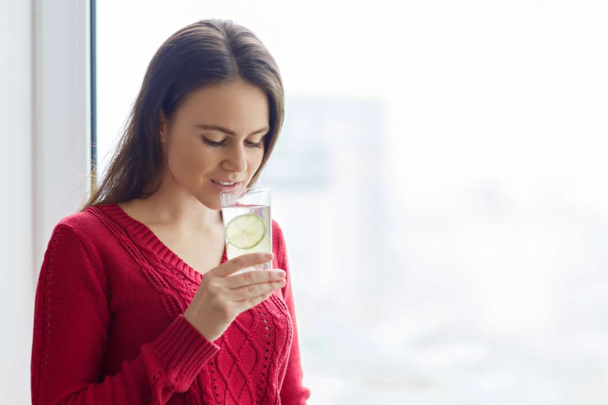 mother drinking water-Postpartum Care And Recovery