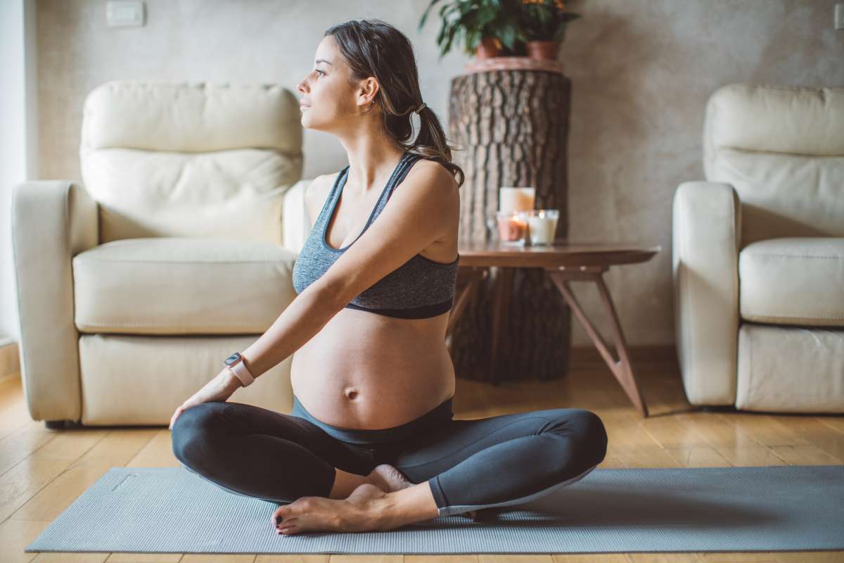 Pregnant woman exercise yoga- Fertility and Art Therapy