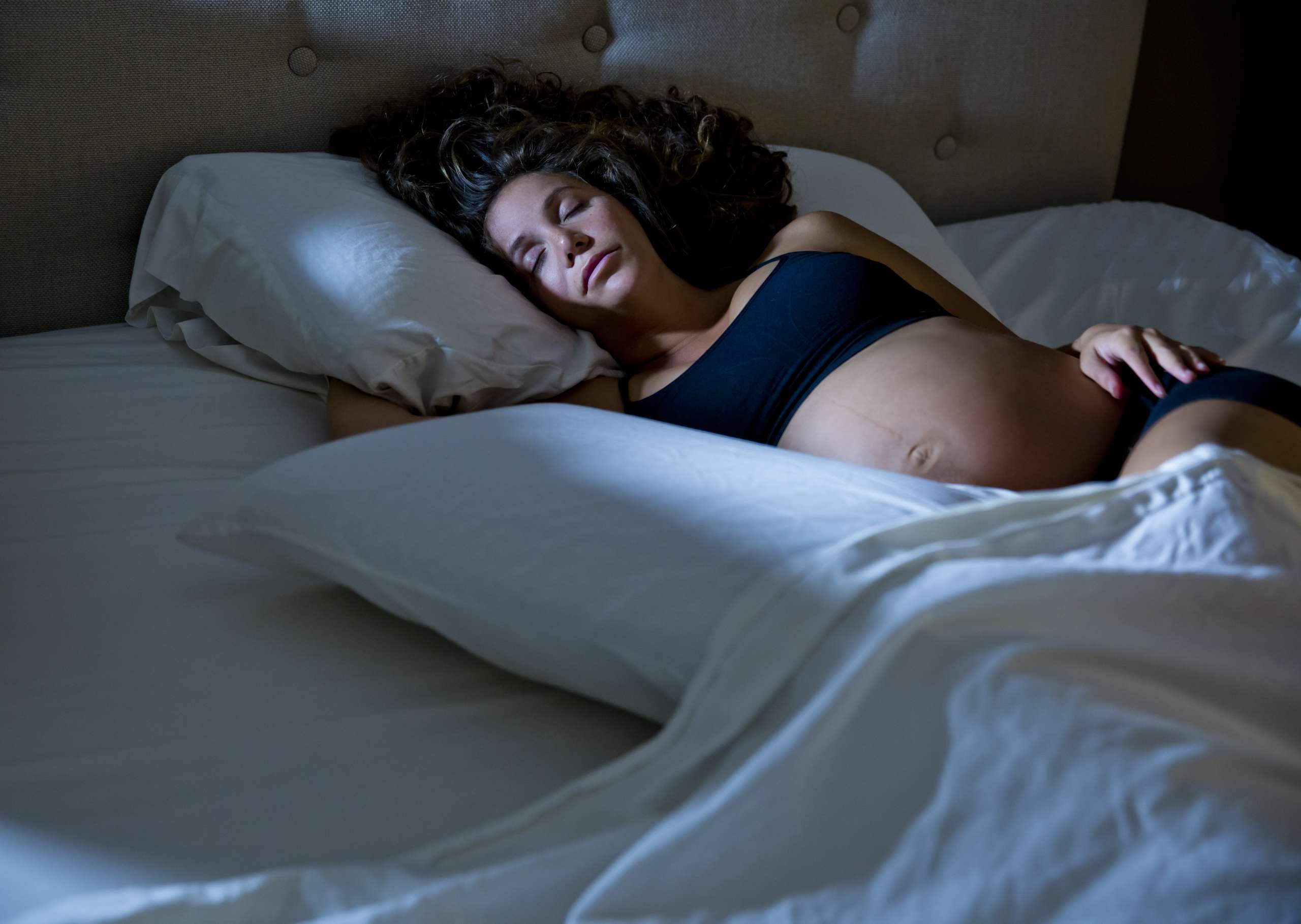 Pregnant Woman Sleeping at Night-Manage Second Trimester Discomfort