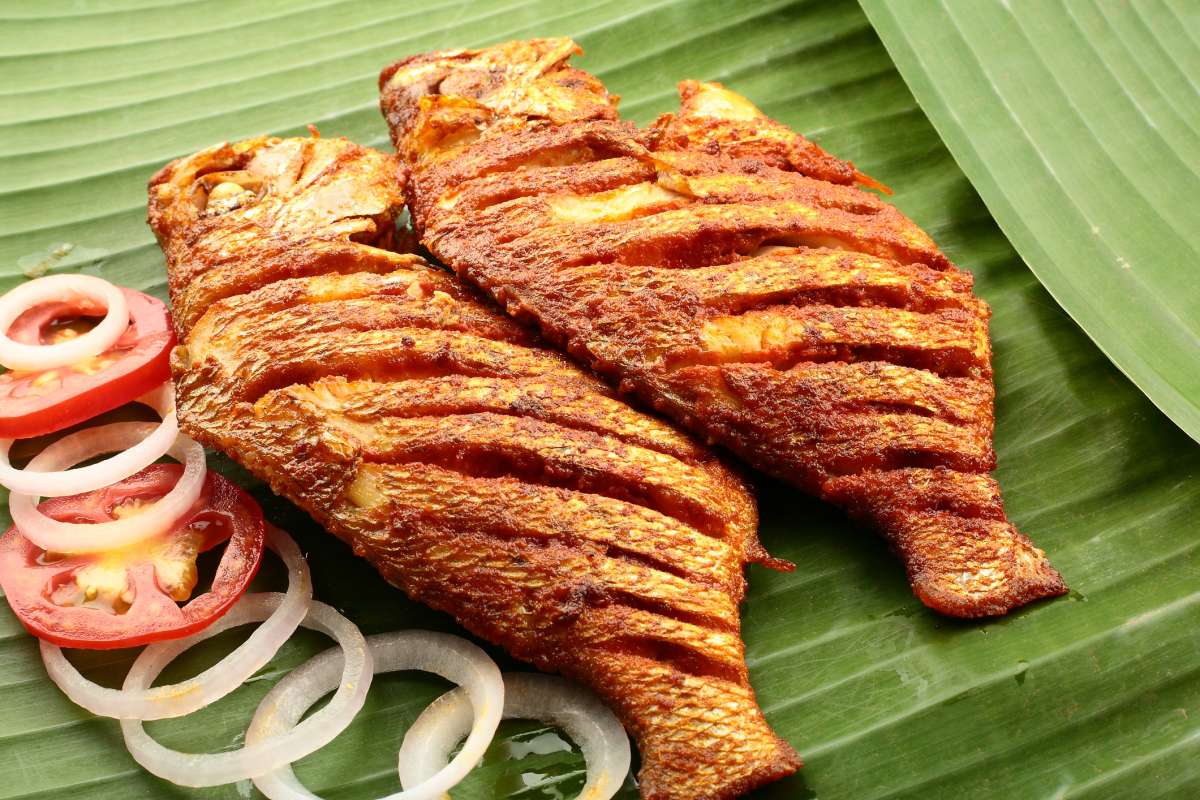 spicy seafood  fish fry served on banana leaf-Seafood Options For Pregnancy