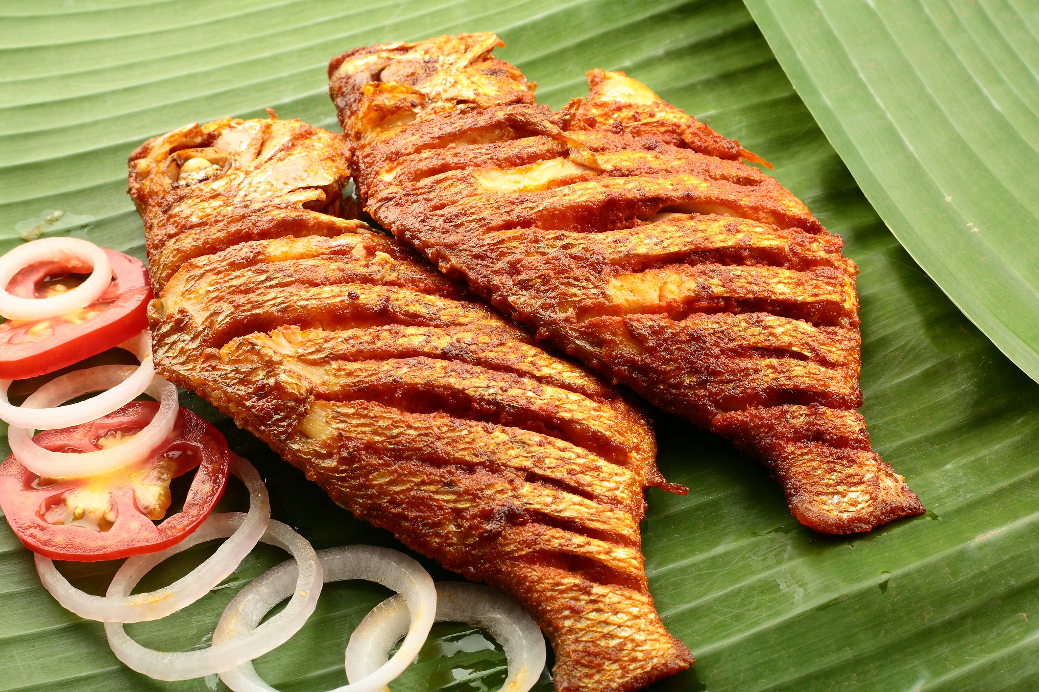 spicy seafood fish fry served on banana leaf - Raw Fish In Pregnancy