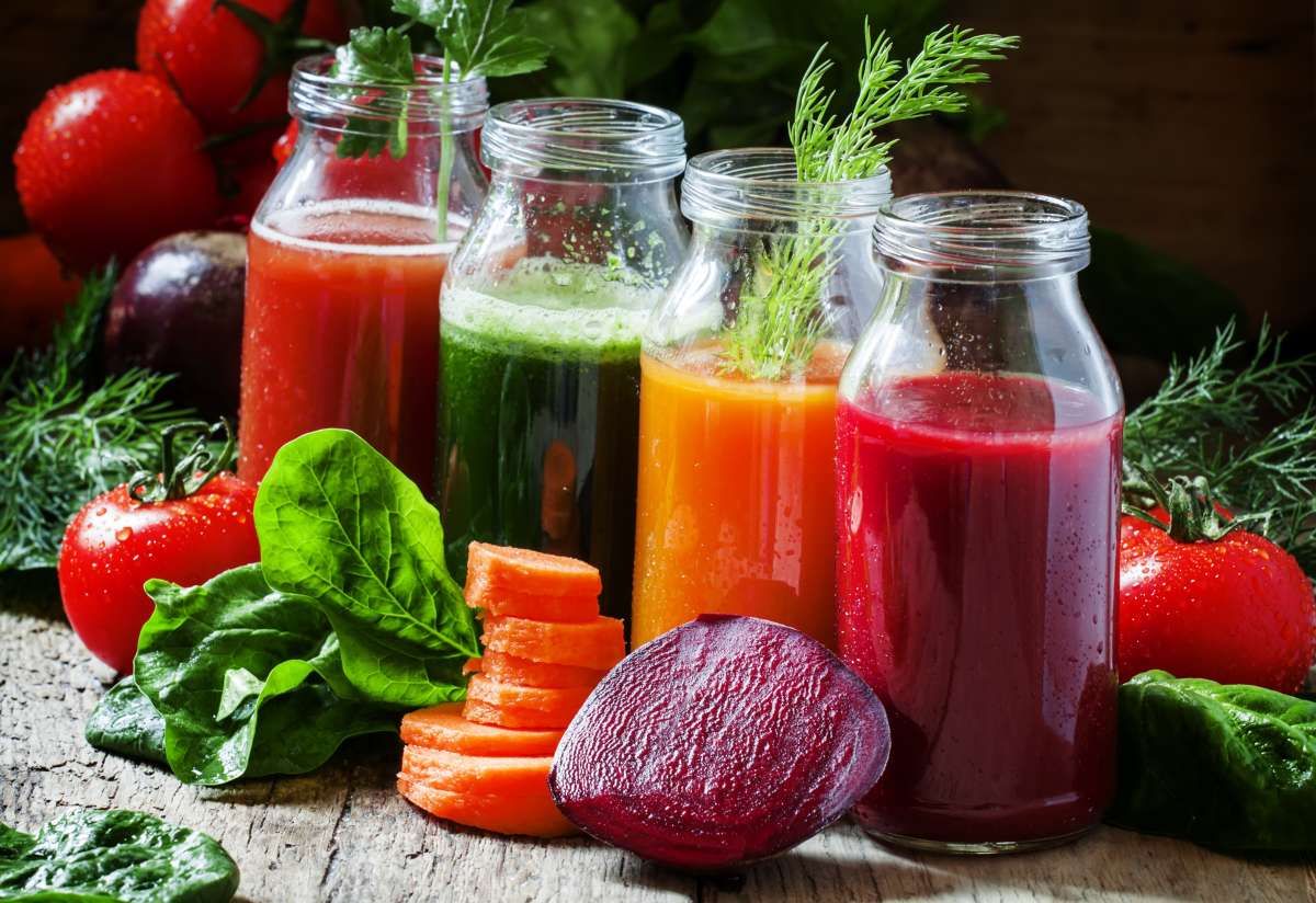 Four kind of vegetable juices: tomato, spinach, carrot, beetroot