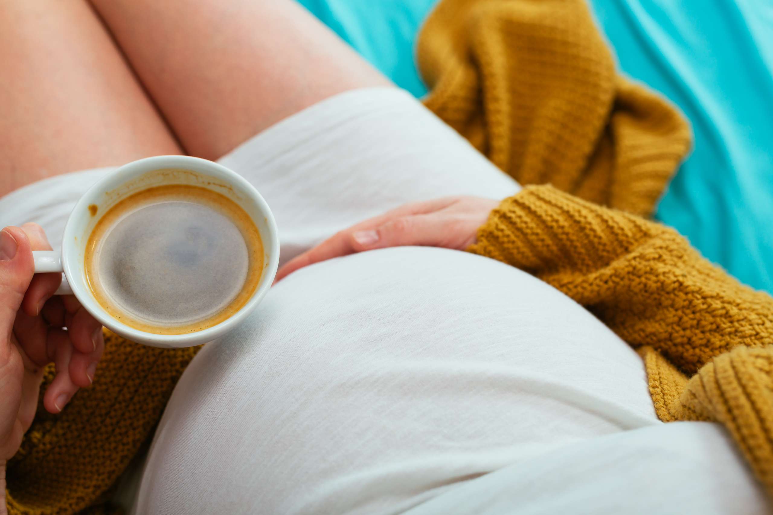 Pregnant woman drinking coffee- Vegetarian Pregnant Women