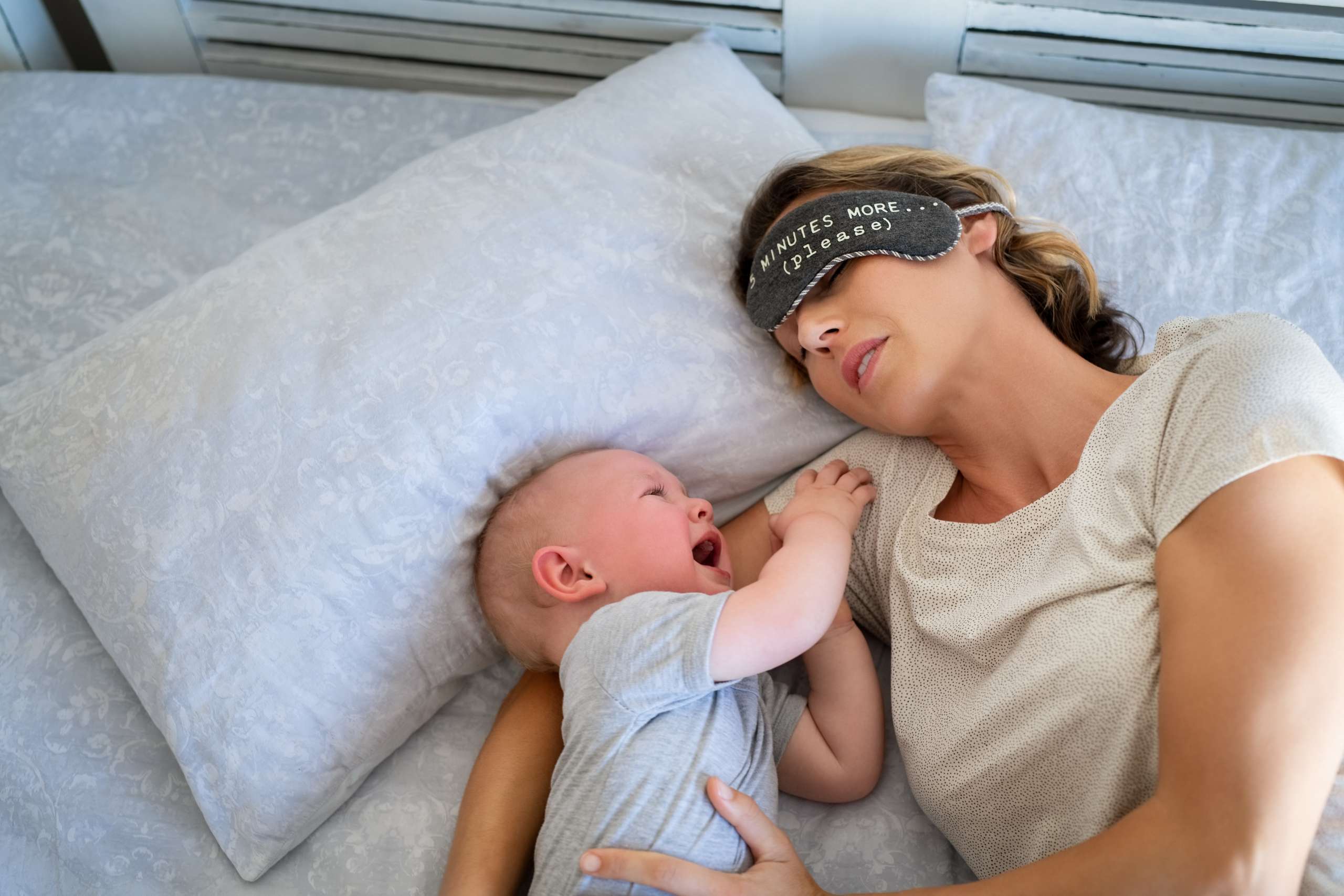 Baby crying while mother sleeping